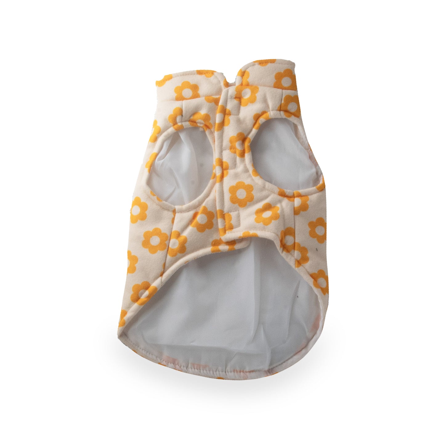 image shows an Axel Roze Pets Flower Power Fleece Coat, coat is cream-colored with an orange floral pattern and has openings for the animal's front legs